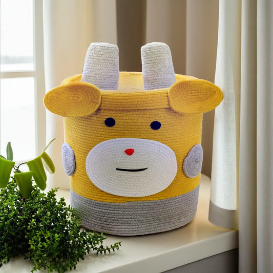 Bright yellow cow laundry basket